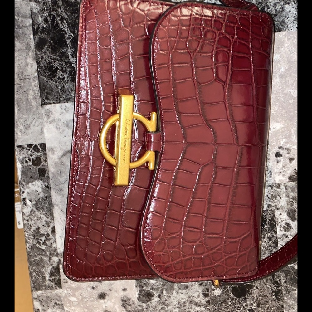Salvatore Ferragamo Burgundy Crossbody Bag with Gold Accent